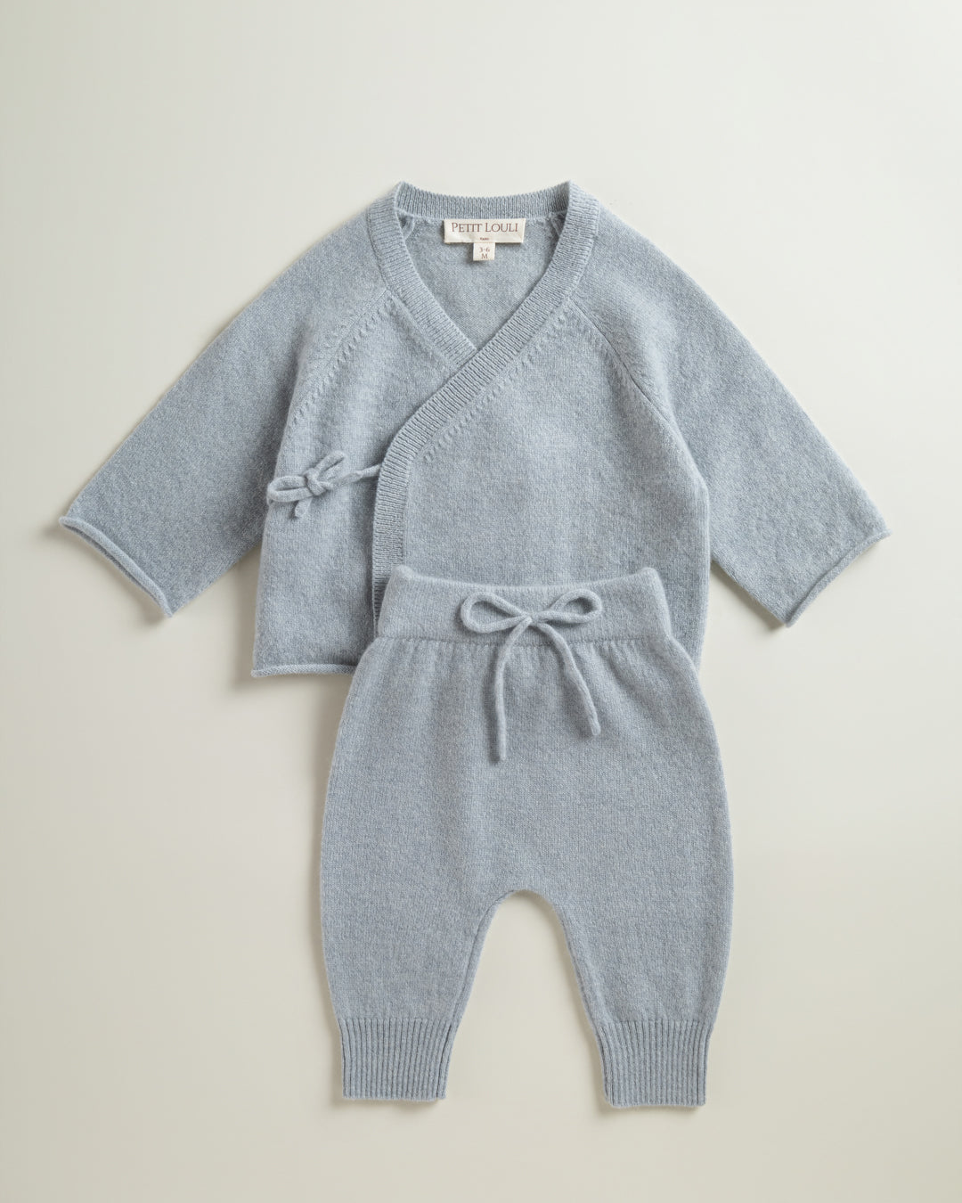 Petit Louli Paris Cashmere Cardigan & Pants Set in rose — flat lay
